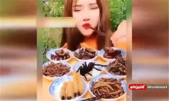 ولع دختر چینی در خوردن انواع حشرات