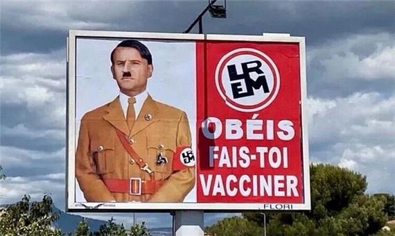 ماکرون با چهره هیتلر روی بیلبورد تبلیغاتی