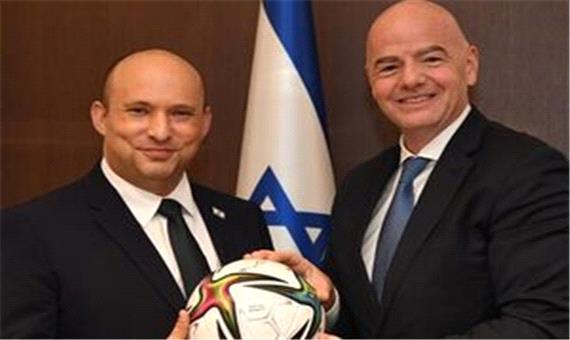 وقتی رئیس فیفا در خدمت صهیونیست‌ها شد/ جام جهانی روی پیکر شهدای فلسطین!
